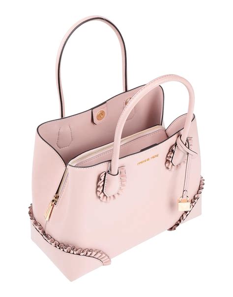 michael kors light pink purse.